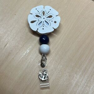 Sand Dollar Badge Reel